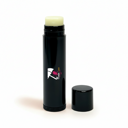 Black lip balm stick with visible brand logo on a white background