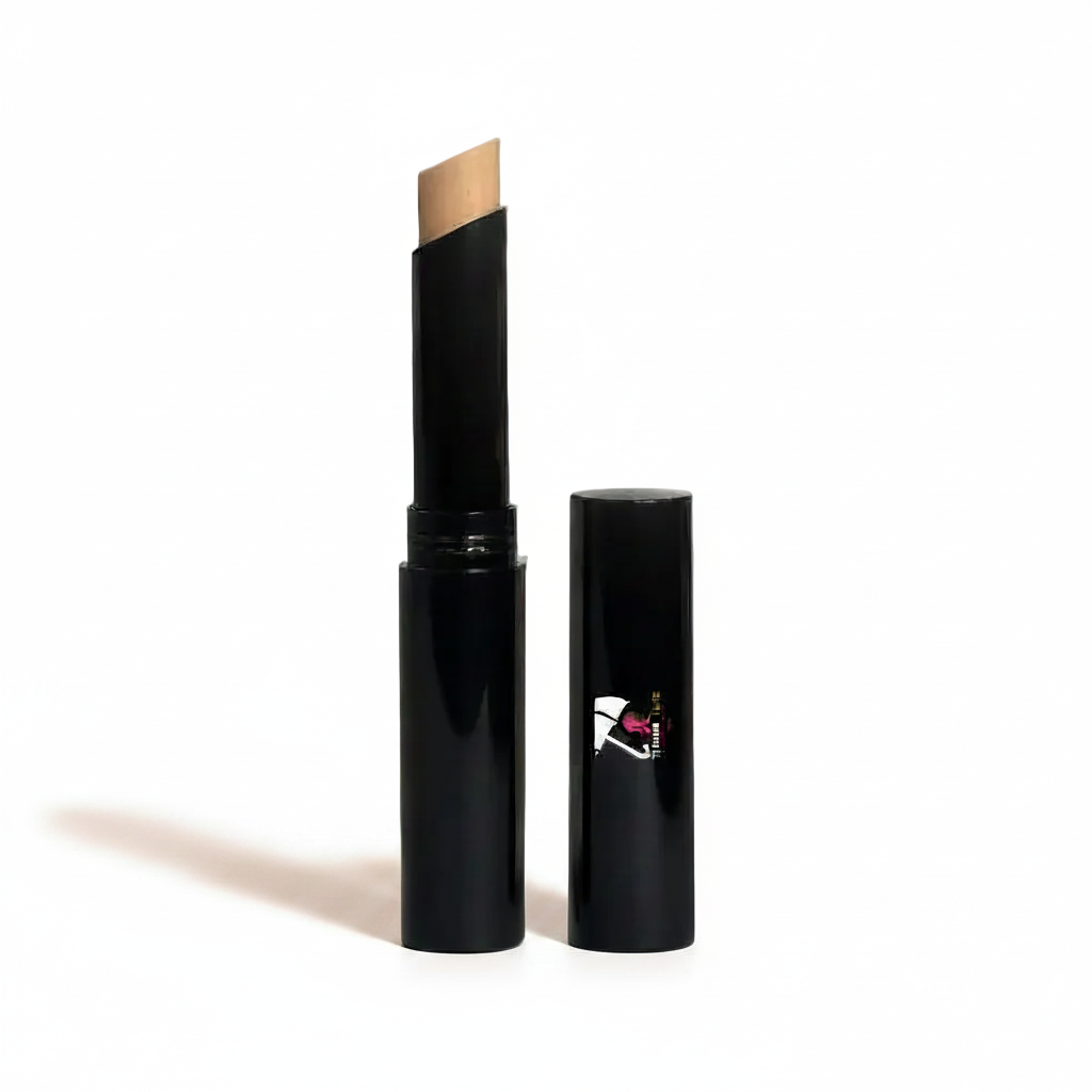 Black cosmetic stick with beige applicator on a white background