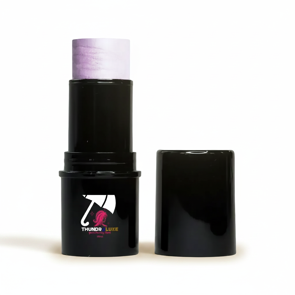 Black makeup stick with purple top and visible brand logo on a light gray background