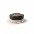 Cosmetic jar with black lid on a gray background