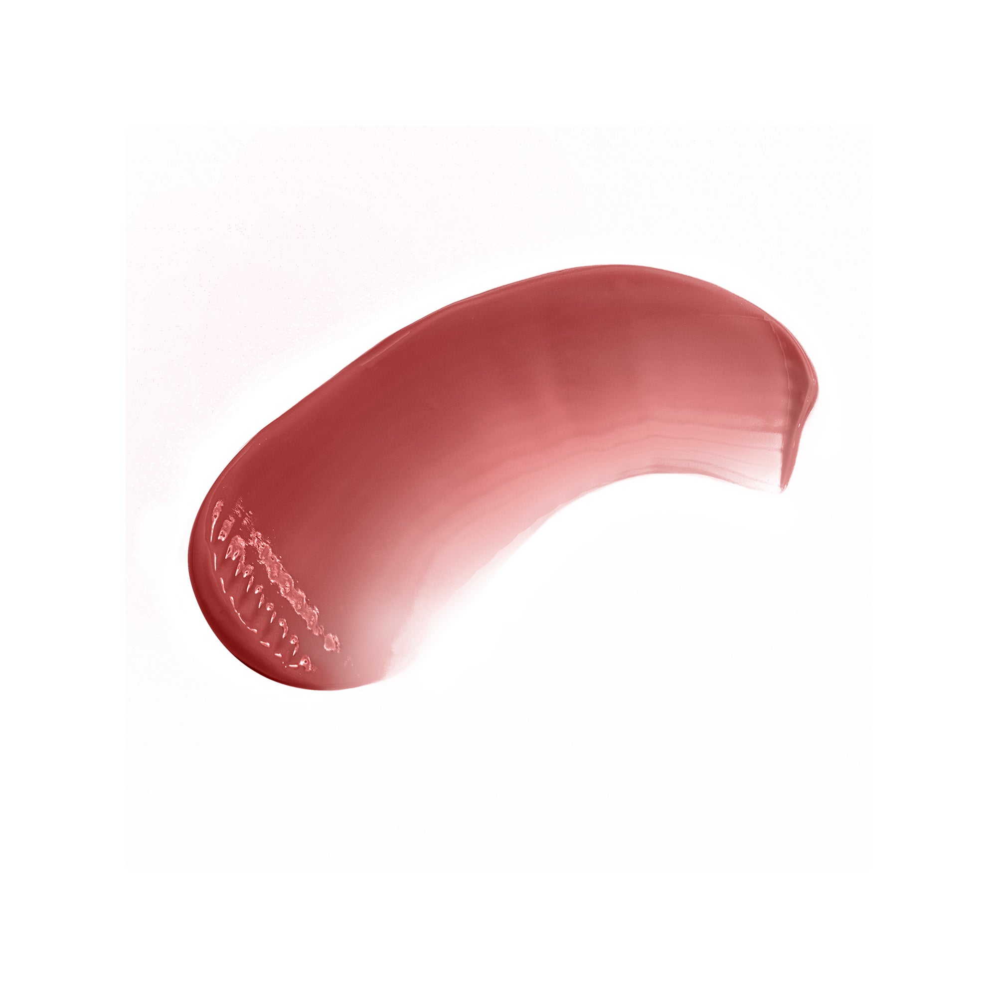 Pink lip balm smear on a white background