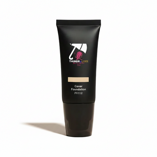Black foundation tube with brand logo on a gray background