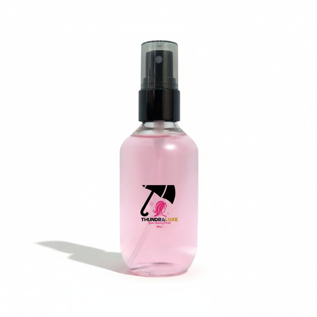 Pink spray bottle with a logo on a white background