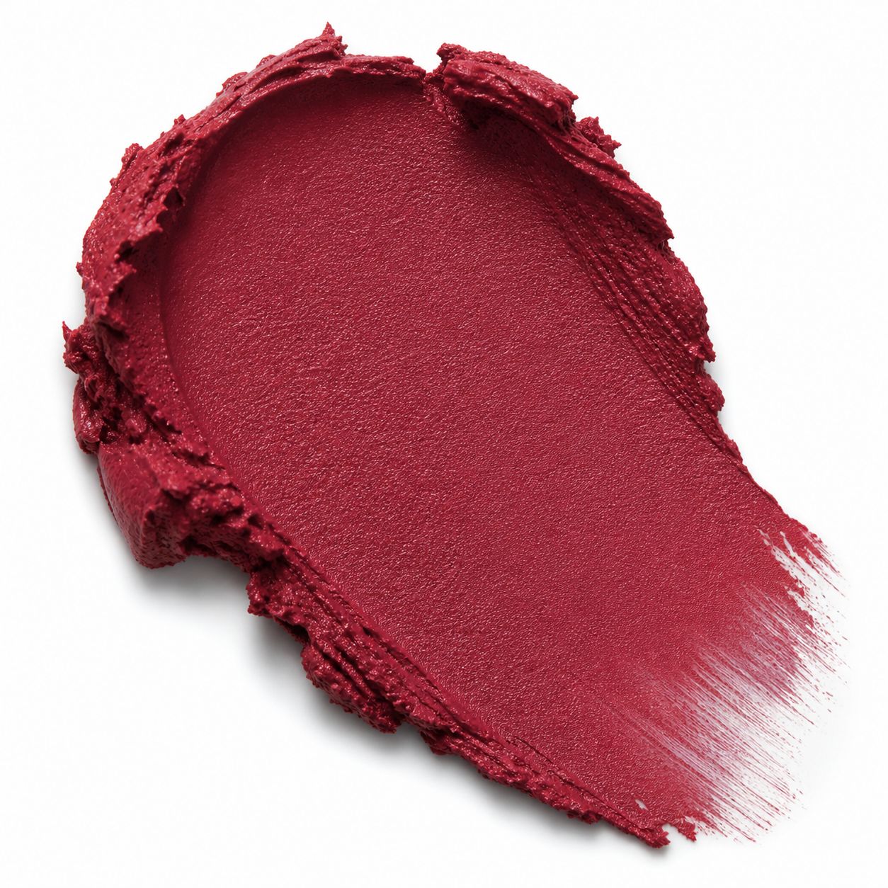 Close-up of a swatch of red makeup on a white background