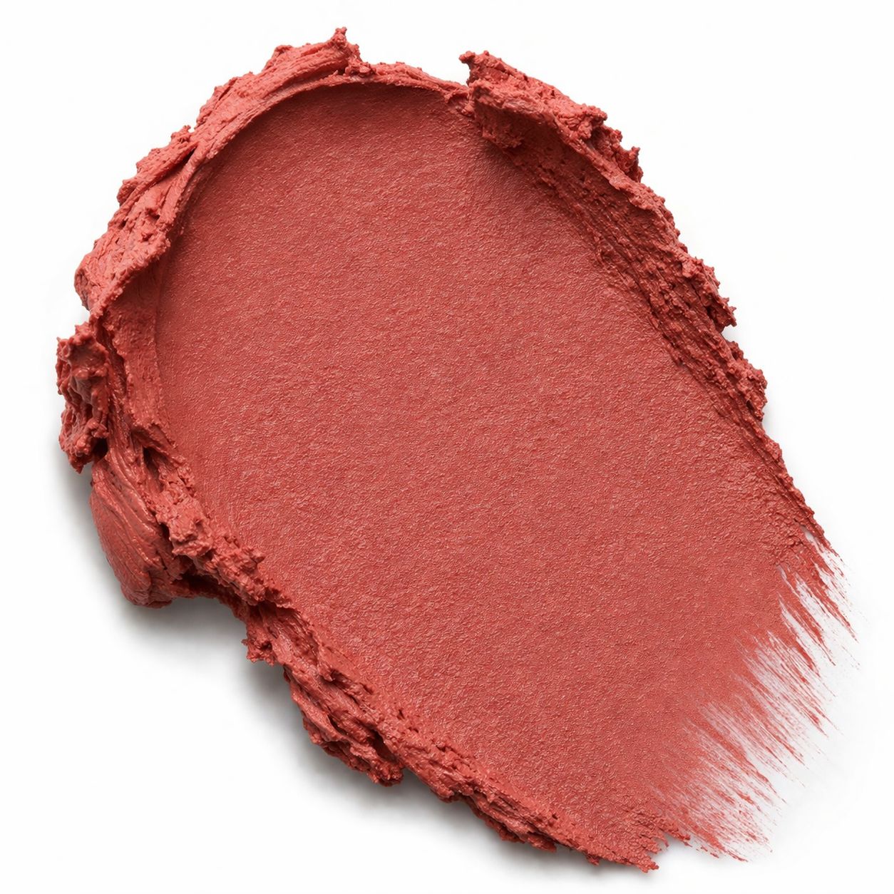 Close-up of a swatch of pink blush makeup on a white background