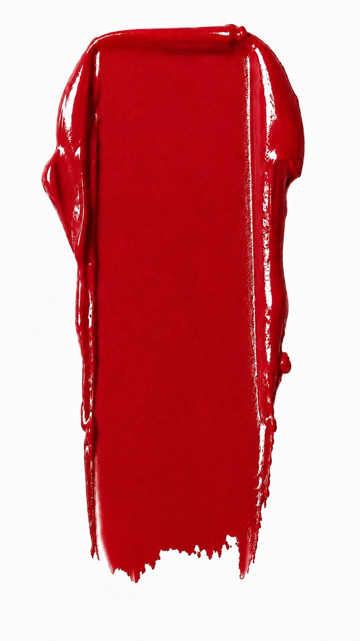 Red lipstick swatch on a white background